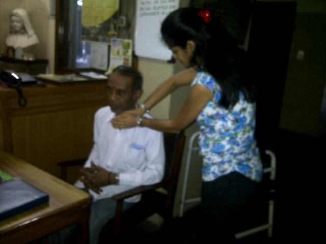 Mr Taraknath receiving healing for Manisha